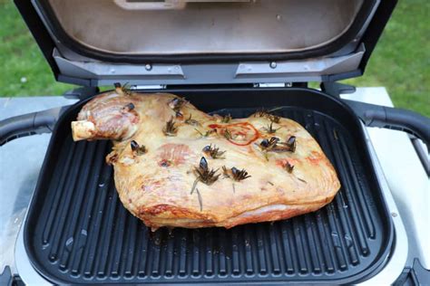 cooking lamb roast on the grill